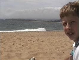 Ryan enjoying his sandwiches on Exmouth beach